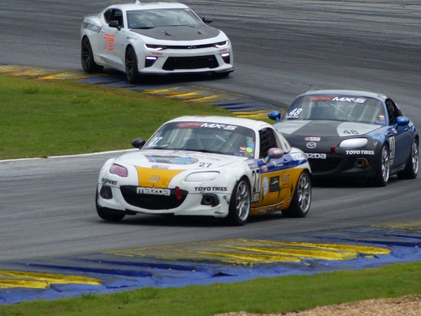 Road Atlanta : spec miatas racing, as well as a Camaro